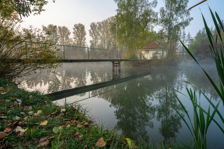 Lake sunrise Long exposure Forest Landscape Houseの写真素材