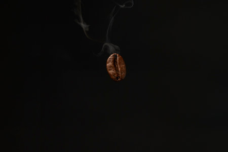 Coffee bean in macro view with steamの写真素材