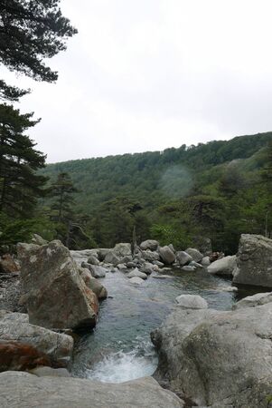 holidays on the island of beauty, in southern Corsica.walk in the mountains, at the river next to the city of Ajaccio. Cascade of the English mountain torrentの写真素材