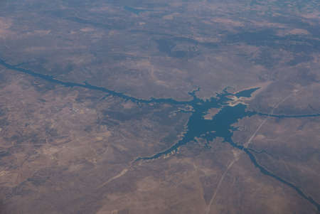 flight over the city of Lisbon by plane. Portugal in summerの写真素材
