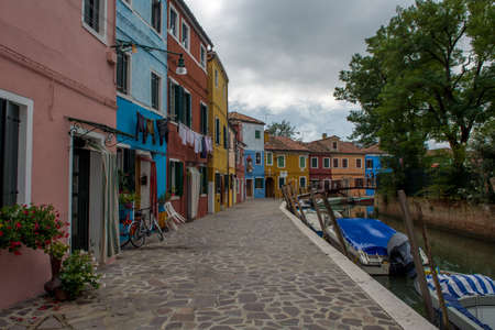 discovery of the city of Venice, Burano and its small canals and romantic alleys, Italyの写真素材