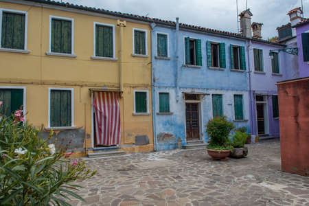 discovery of the city of Venice, Burano and its small canals and romantic alleys, Italyの写真素材