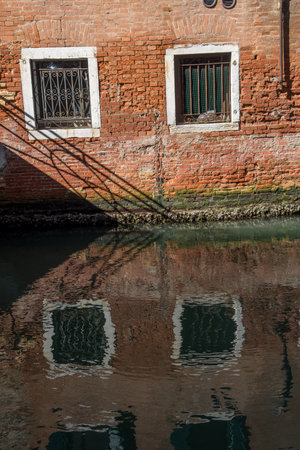 discovery of the city of Venice and its small canals and romantic alleys, Italyの写真素材