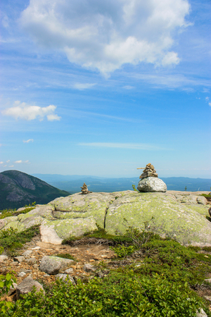 rock sculpture on top of parc des grands-jardinsの写真素材