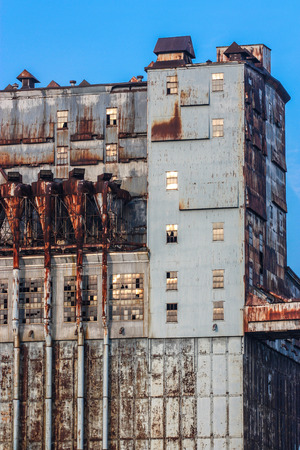 old industrial building on blue skyの写真素材