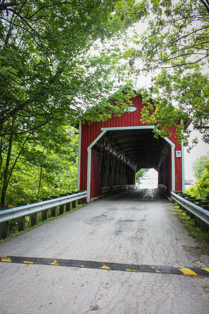 old covered bridge in the forestの写真素材