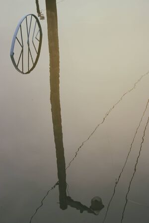 reflection of wires and telephone poleの写真素材