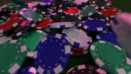 Falling poker chips in red & blue light.の写真素材