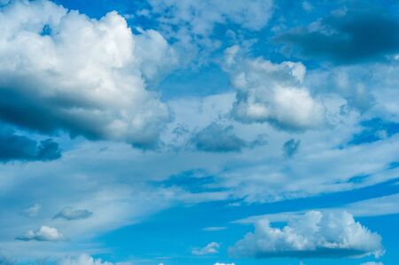 blue sky with fluffy clouds