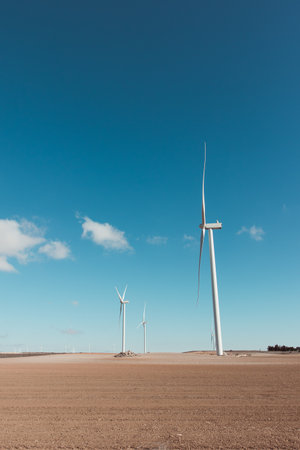 Windmills and blue skiesの写真素材