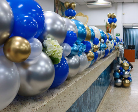 Decoration with blue and silver balloons for a university graduation party.の写真素材