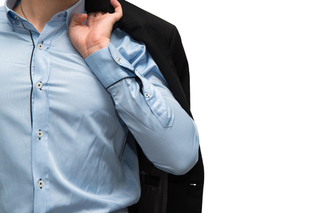 Man holds jacket on his arm isolated on white backgroundの写真素材