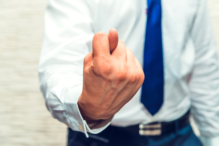 Man shows sign using his hand. You will get nothing, and will give you nothing.