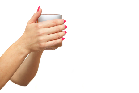 Cup held in hands.の写真素材