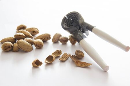 Almond nuts isolated on white background close upの写真素材
