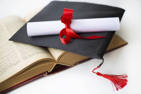 Black graduation cap and degreeの写真素材