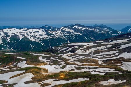 Panoramic view of the city Petropavlovsk-Kamchatsky and volcanoes: Koryaksky Volcano, Avacha...