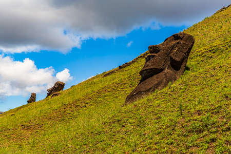 Moai statues in the Rano Raraku Volcano in Easter Island, Rapa Nui National Park, Chileの写真素材