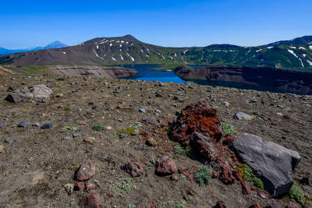 Panoramic view of the city Petropavlovsk-Kamchatsky and volcanoes: Koryaksky Volcano, Avacha Volcano, Kozelsky Volcano. Russian Far East, Kamchatka Peninsula.の写真素材