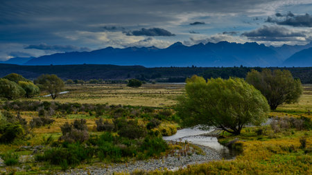 The beautiful landscape of the southern island of New Zealand is a mountain range of lake forests.の写真素材