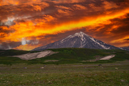 Panoramic view of the city Petropavlovsk-Kamchatsky and volcanoes: Koryaksky Volcano, Avacha Volcano, Kozelsky Volcano. Russian Far East, Kamchatka Peninsula.の写真素材