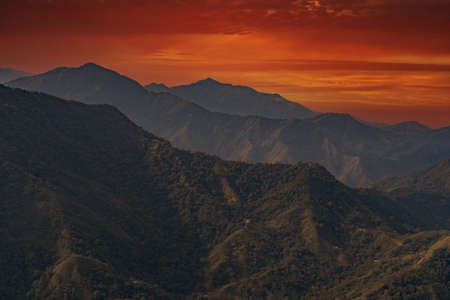 Sunrise over the mountains of the Sierra Nevada de Santa Marta on the way to Lost Cityの写真素材