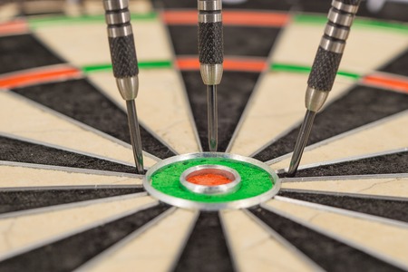 Dart not in bulls eye, close upの写真素材