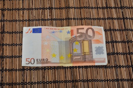 Fifty Euro on bamboo background 