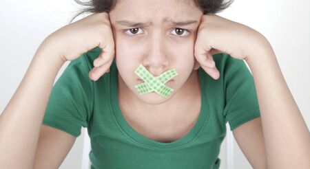 Girl mouth is glued to a band