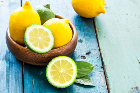 Fresh lemons on wooden tableの写真素材