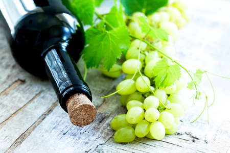 Wine bottle and grapeの写真素材
