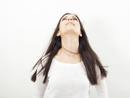 Young woman looking upの写真素材