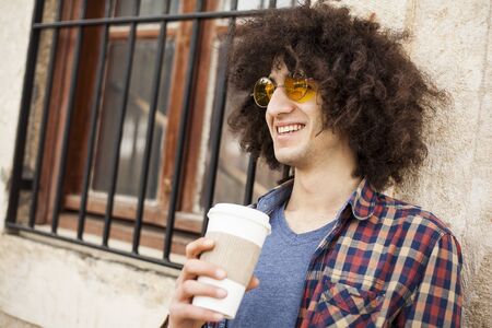 Young man drink coffeeの写真素材