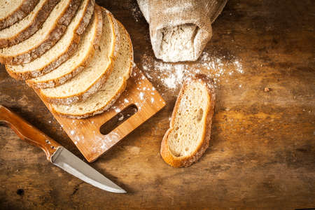 Bread on wooden background