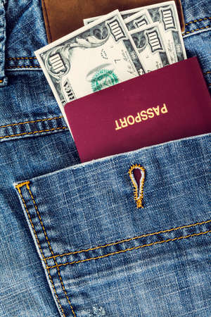Passport and money in pocketの写真素材