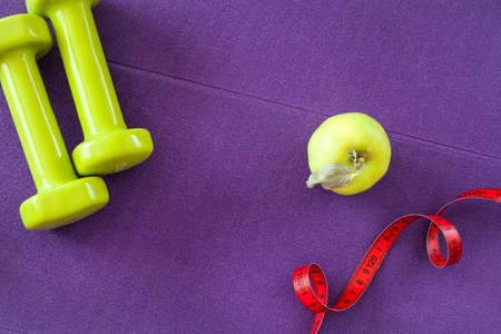 Sport equipments on yoga matの写真素材