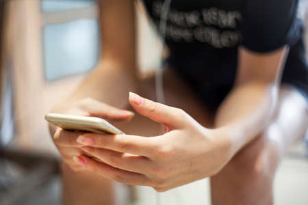 Woman using mobile phoneの写真素材