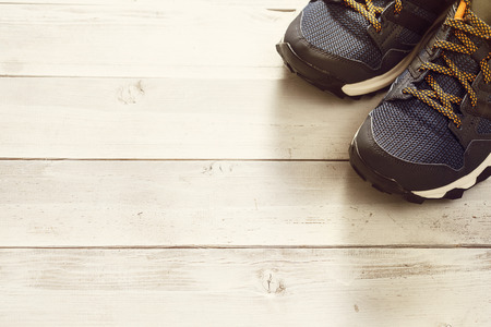 Sport shoes on wooden backgroundの写真素材