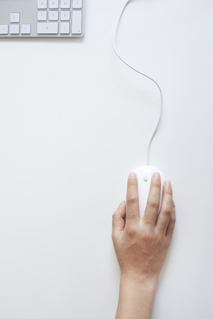 Woman hand on mouseの写真素材