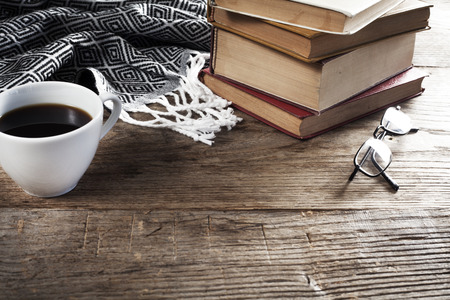 Reading books with coffee on tableの写真素材