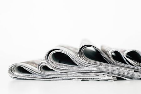 Newspapers on white background