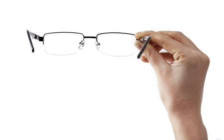 Woman hand holding eyeglassesの写真素材