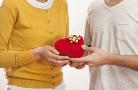 People giving gift in boxの写真素材