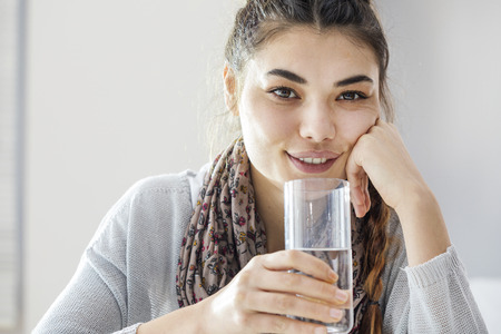 Portrait woman drinking water
