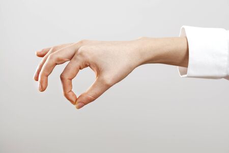 Woman hand holding some like a blankの写真素材