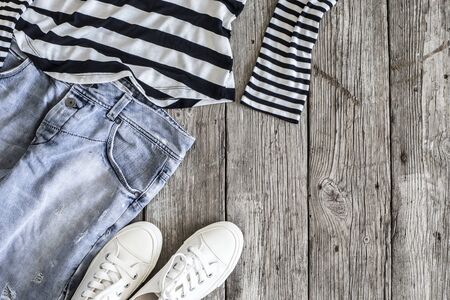 Fashionable women clothes on wooden backgroundの写真素材