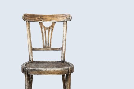 Old wooden chair on gray backgroundの写真素材