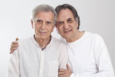 Portrait elderly people looking at camera