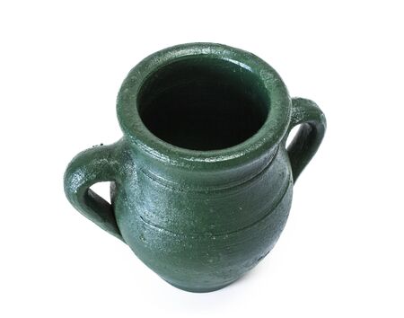 Green pitcher on white backgroundの写真素材