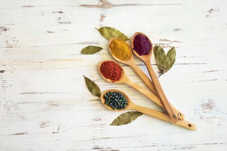 Spices and herbs on wooden backgroundの写真素材